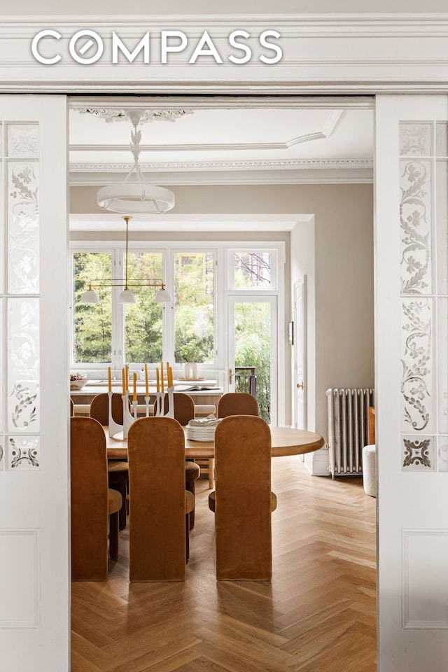 130 Fort Greene Place, New York City, NY 11217 - dining area featuring radiator, ornamental molding, and healthy amount of natural light