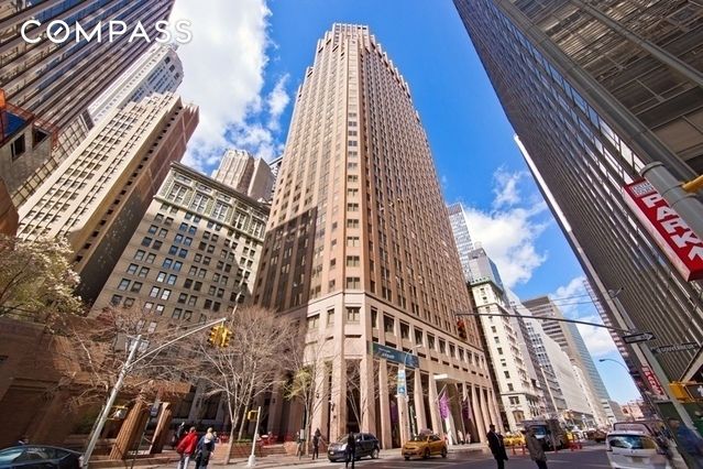 75 Wall St Unit 36F, New York City, NY 10005 - view of building exterior with a view of city