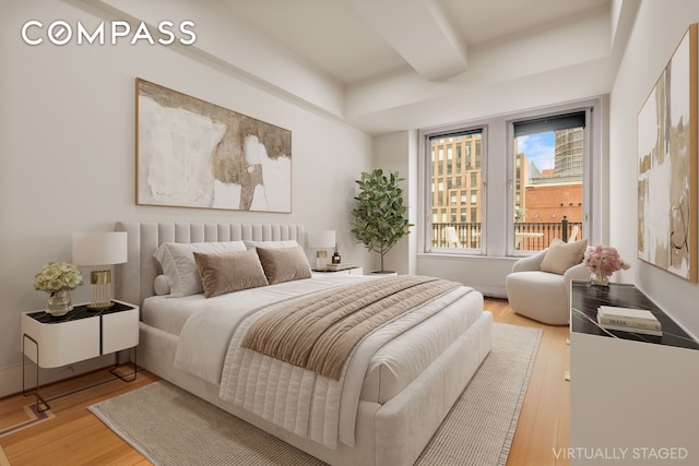 252 W 30th St Unit 12, New York City, NY 10001 - bedroom featuring wood finished floors