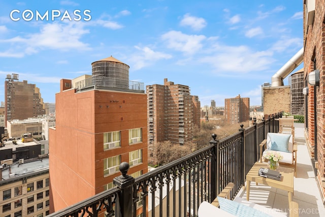 balcony featuring a city view