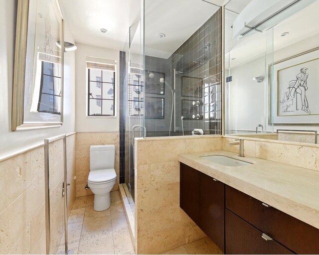 333 W 56th St Unit 8I, New York City, NY 10019 - living room featuring baseboards and wood finished floors