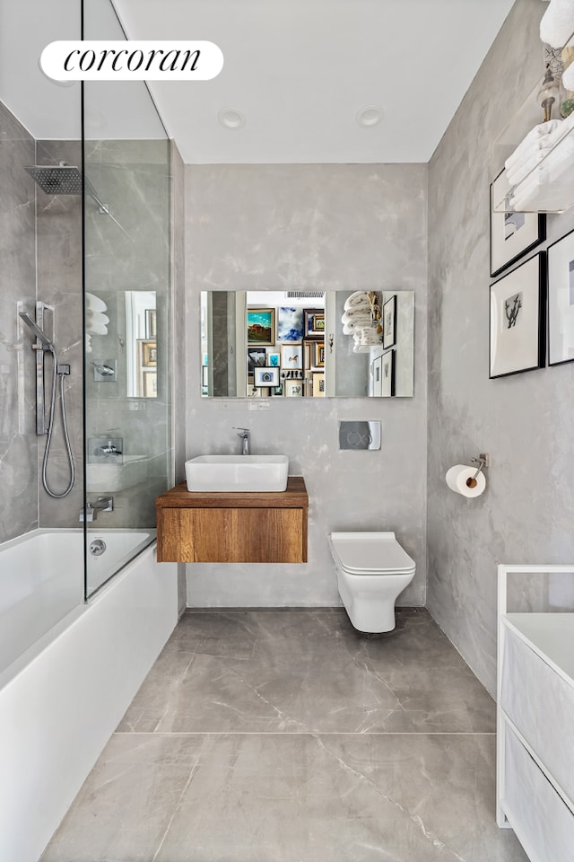 508 Waverly Ave Unit 4, New York City, NY 11238 - full bath featuring vanity, bathtub / shower combination, marble finish flooring, and toilet