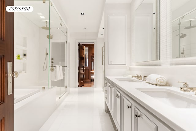 46 E 66th St, New York City, NY 10065 - bathroom featuring a shower stall, double vanity, a bath, and tile patterned flooring