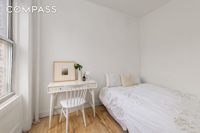 345 W 4th St Unit 8, New York City, NY 10014 - bedroom with light wood-type flooring and baseboards