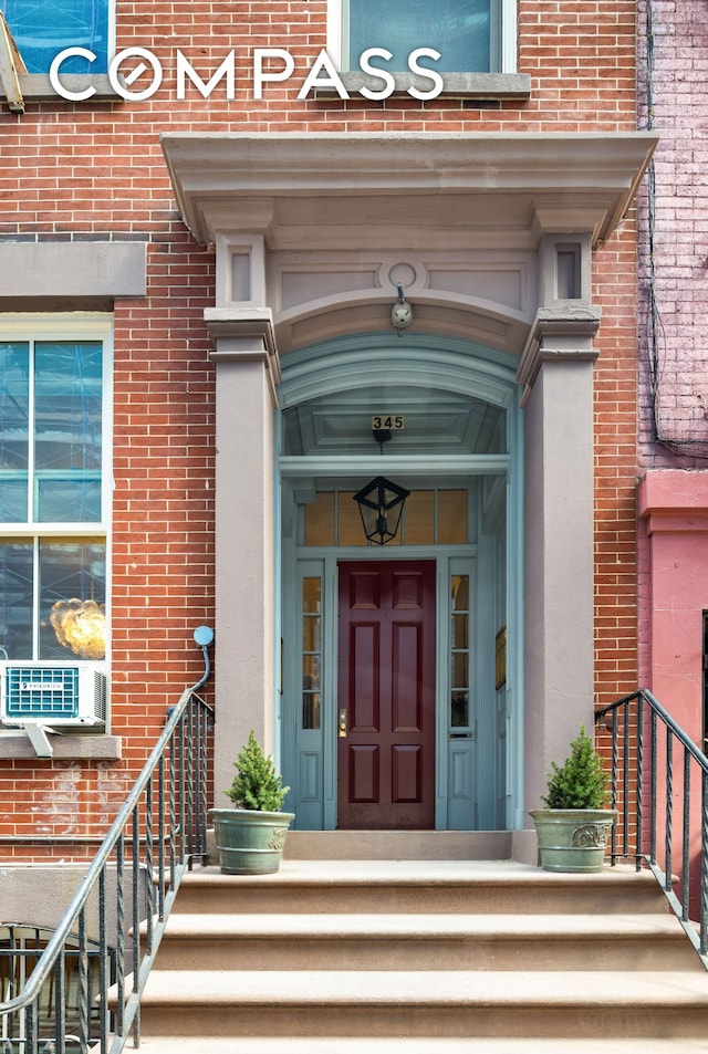 345 W 4th St Unit 8, New York City, NY 10014 - entrance to property featuring brick siding and cooling unit