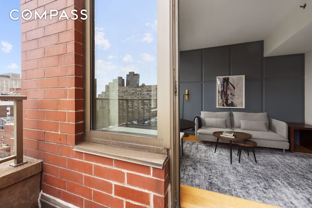 250 E 30th St Unit 14B, New York City, NY 10016 - balcony featuring a city view and outdoor lounge area