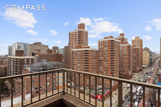 balcony featuring a city view