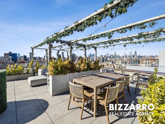 208 Delancey St Unit 8F, New York City, NY 10002 - view of patio / terrace with a skyline view and outdoor dining area