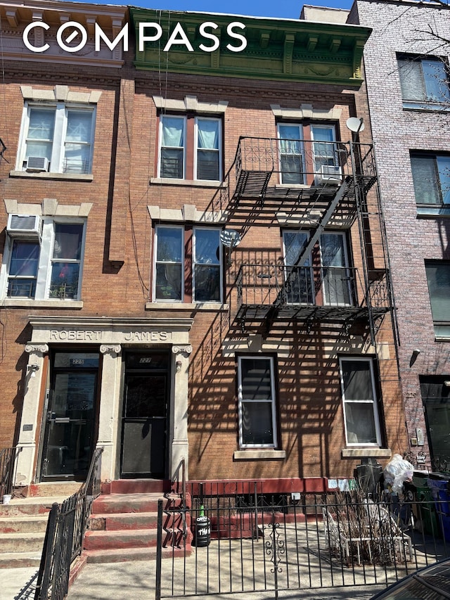 227 55th St, New York City, NY 11220 - multi unit property featuring brick siding and entry steps