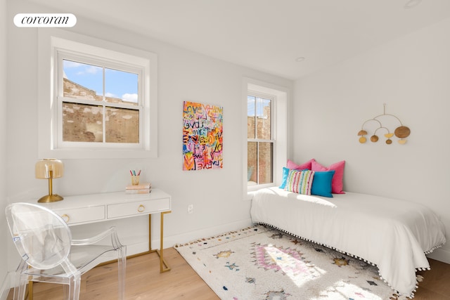 64 2nd St, New York City, NY 11231 - bedroom featuring multiple windows and wood finished floors
