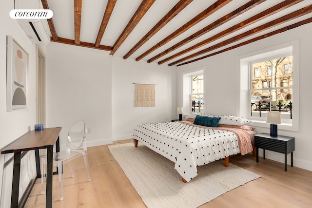 64 2nd St, New York City, NY 11231 - bedroom with light wood-type flooring and beamed ceiling