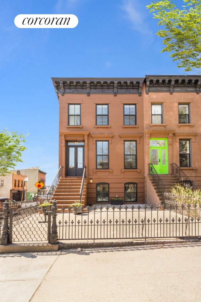 64 2nd St, New York City, NY 11231 - view of front of house with a fenced front yard