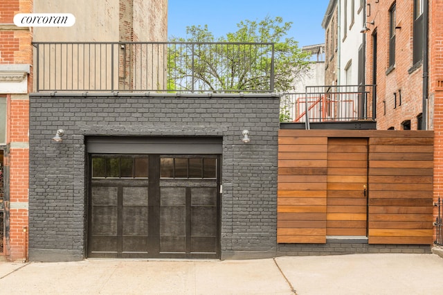 64 2nd St, New York City, NY 11231 - exterior space featuring driveway and a garage