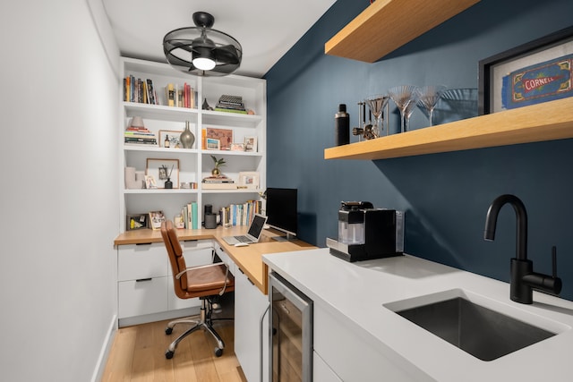69 5th Ave Unit 9Gh, New York City, NY 10003 - office area featuring a sink, wine cooler, light wood finished floors, and built in study area