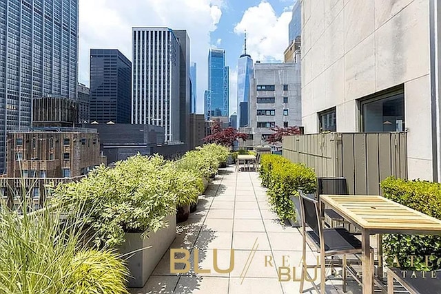 99 John St Unit Ph-9, New York City, NY 10038 - view of patio with a skyline view