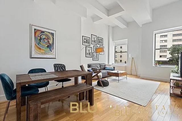 99 John St Unit Ph-9, New York City, NY 10038 - home office with light wood finished floors, beam ceiling, coffered ceiling, and baseboards