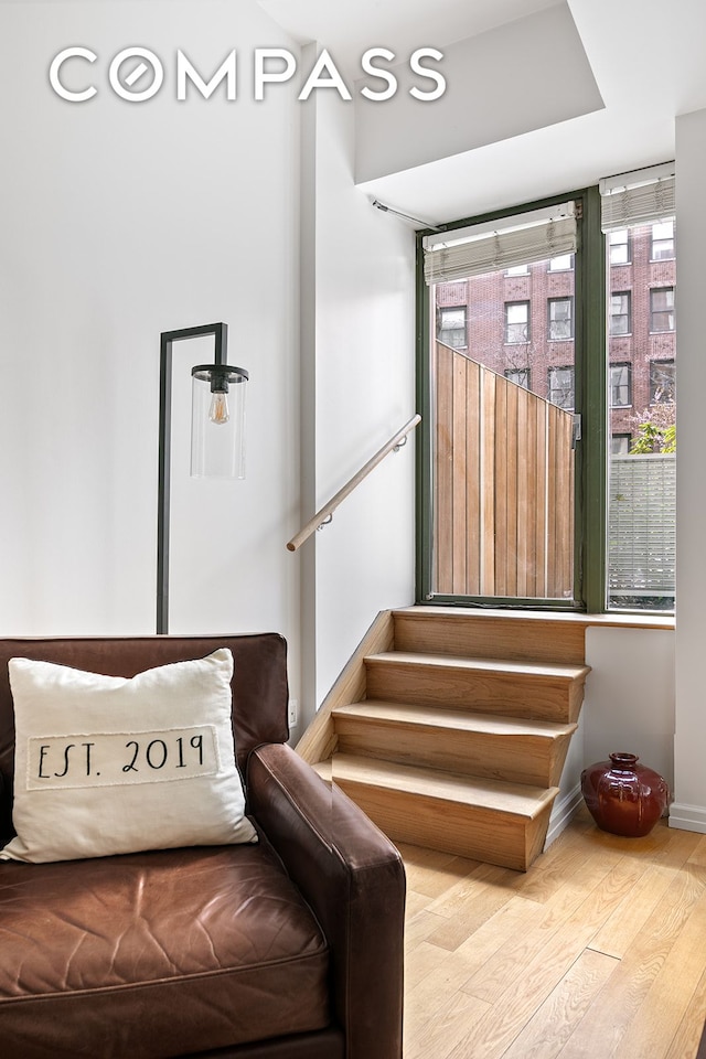 99 John St Unit 522, New York City, NY 10038 - stairway with wood finished floors and baseboards