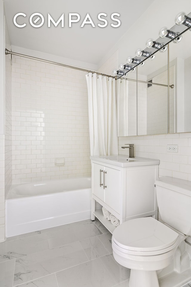 99 John St Unit 522, New York City, NY 10038 - full bath featuring shower / bath combo, toilet, vanity, and marble look tile flooring