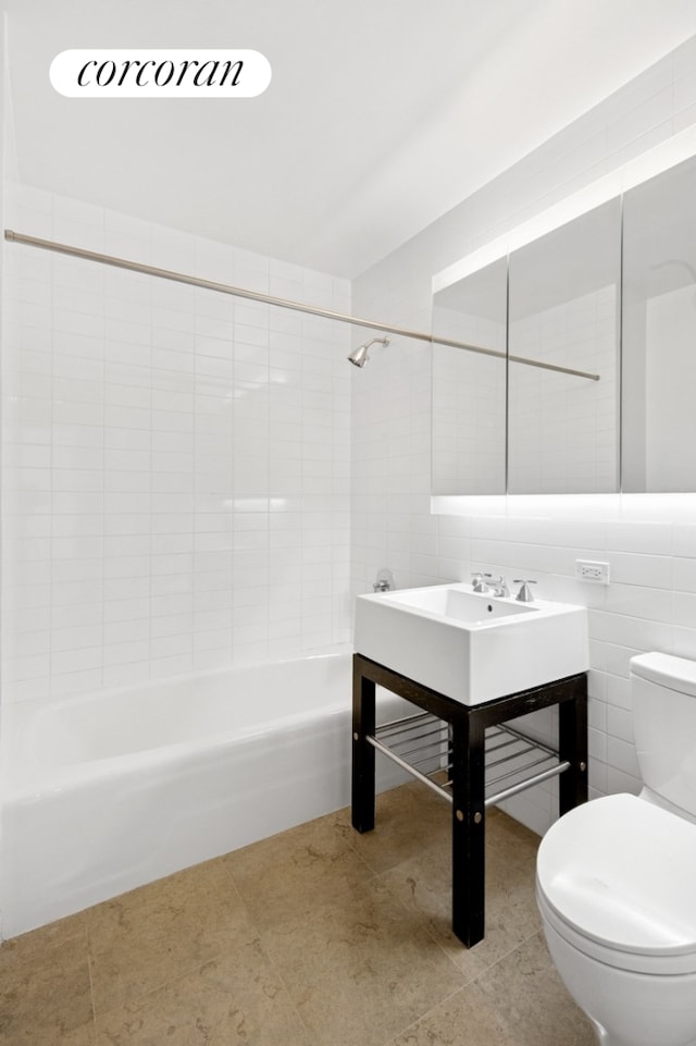 full bath featuring toilet, shower / bath combination, tile patterned floors, and vanity