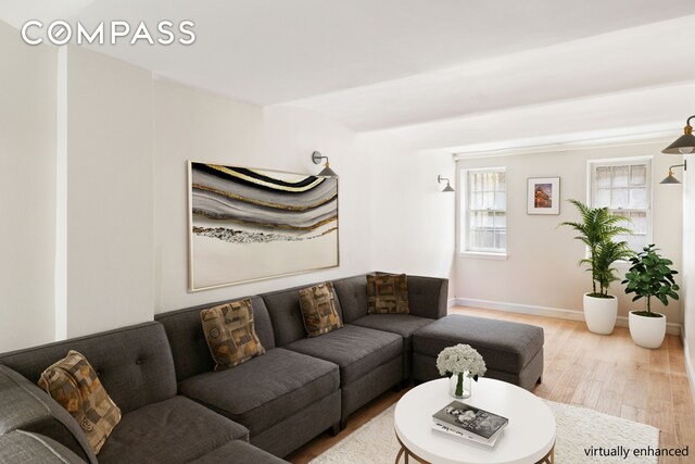 330 E 94th St Unit 1Ab, New York City, NY 10128 - living room featuring wood finished floors and baseboards