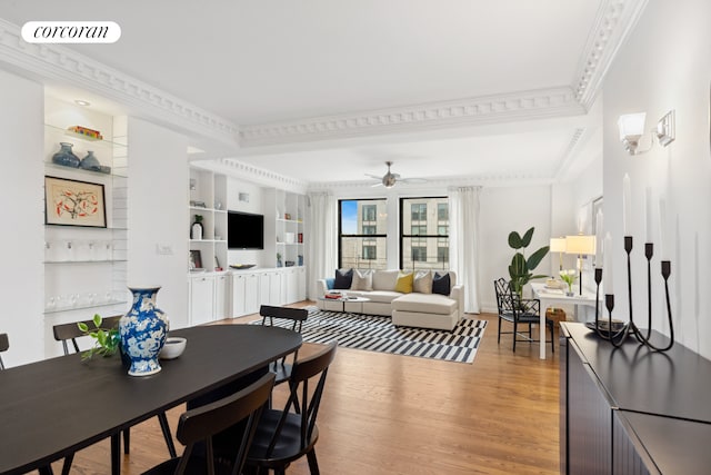 215 W 91st St Unit 111, New York City, NY 10025 - dining space with light wood finished floors, ornamental molding, and ceiling fan