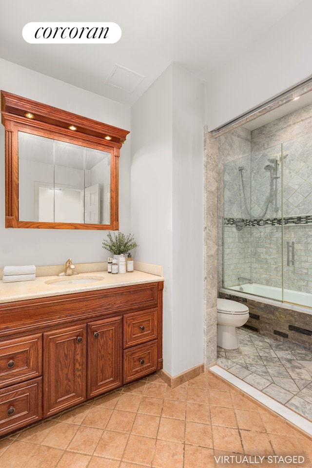 310 E 46th St Unit 9C, New York City, NY 10017 - full bath featuring toilet, tiled shower / bath combo, vanity, tile patterned flooring, and baseboards