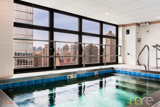 340 E 93rd St Unit 28D, New York City, NY 10128 - community pool with a view of city