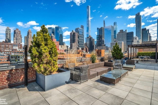 432 W 52nd St Unit 7H, New York City, NY 10019 - view of patio featuring an outdoor hangout area and a skyline view
