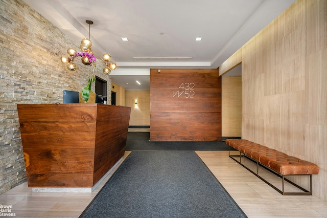 432 W 52nd St Unit 7H, New York City, NY 10019 - reception area featuring a chandelier
