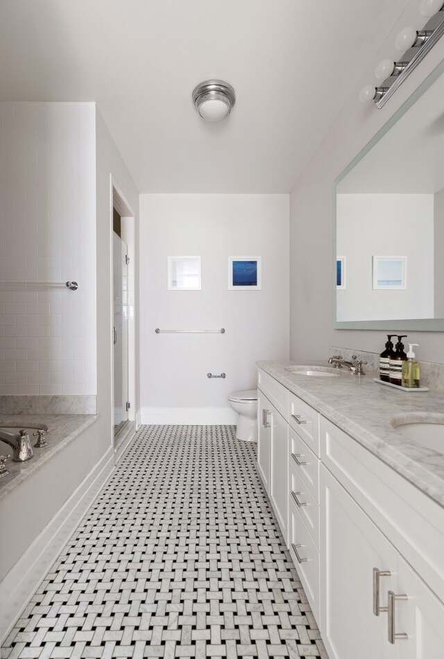 30 Main St Unit 9D, New York City, NY 11201 - full bath with baseboards, toilet, a shower stall, double vanity, and a tub to relax in