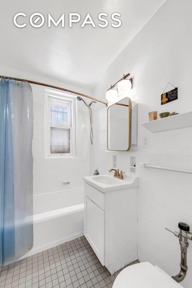 full bathroom featuring vanity, shower / bathtub combination with curtain, tile patterned flooring, and toilet