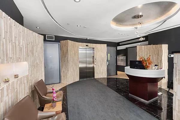 337 E 62nd St Unit Twnhse1A, New York City, NY 10065 - welcome area with recessed lighting