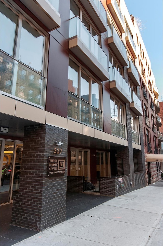337 E 62nd St Unit Twnhse1A, New York City, NY 10065 - view of building exterior