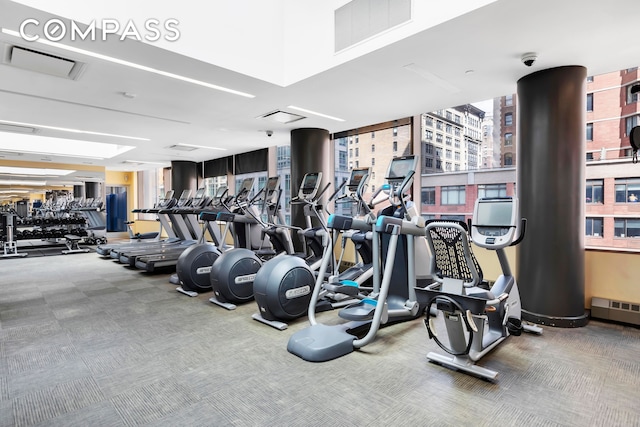 workout area featuring carpet floors and visible vents