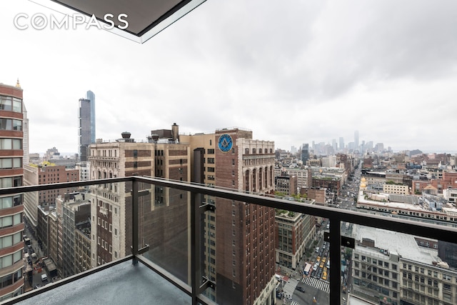 balcony featuring a city view