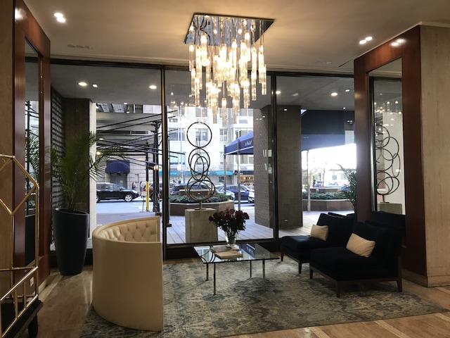 58 W 58th St Unit 9D, New York City, NY 10019 - community lobby with floor to ceiling windows