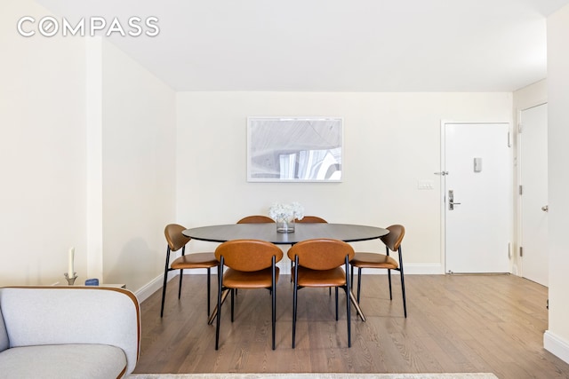 100 W 93rd St Unit 11J, New York City, NY 10025 - dining room featuring wood finished floors and baseboards