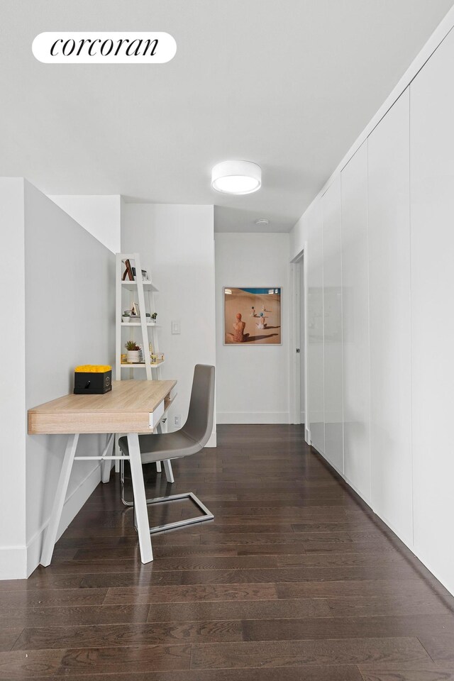 7 E 14th St Unit 1406, New York City, NY 10003 - dining space featuring baseboards, dark wood-style flooring, and an office area
