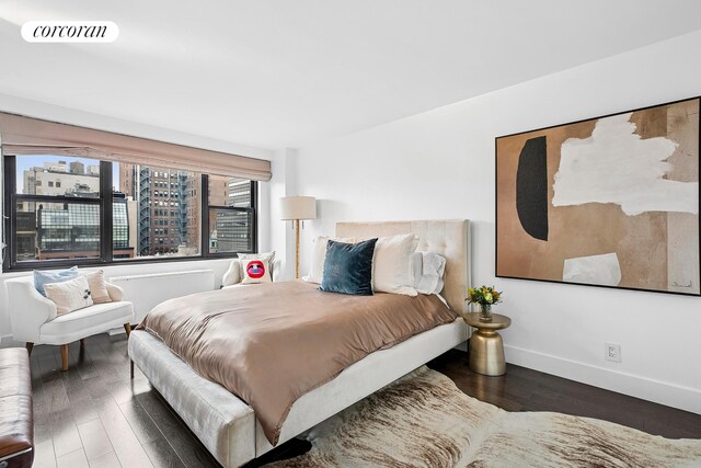 7 E 14th St Unit 1406, New York City, NY 10003 - bedroom featuring wood finished floors and baseboards
