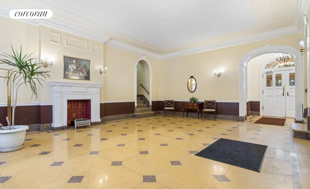 building lobby with stairs and visible vents