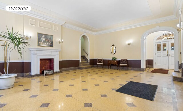 176 Seeley St Unit A2, New York City, NY 11218 - lobby with wainscoting, ornamental molding, and stairs