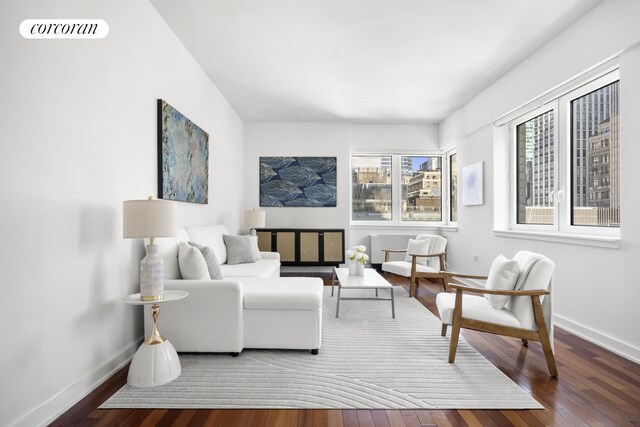 425 5th Ave Unit 22F, New York City, NY 10016 - living area with wood-type flooring and baseboards