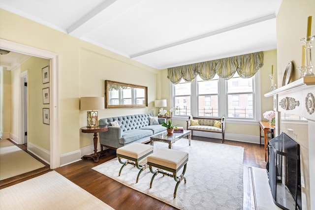 114 E 84th St Unit 8B, New York City, NY 10028 - living room with beam ceiling, wood finished floors, and baseboards