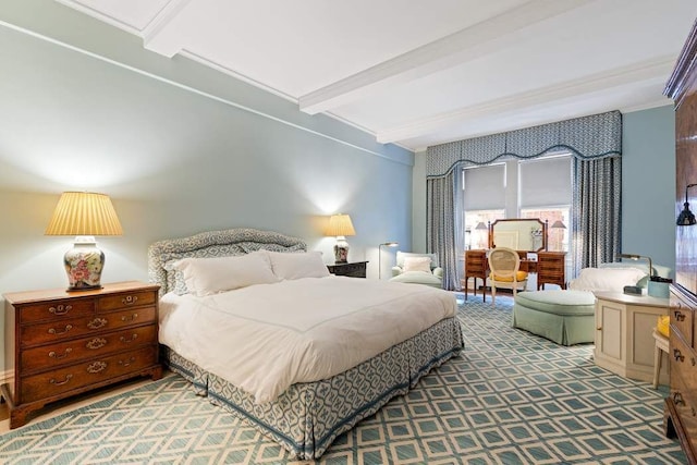 bedroom featuring beamed ceiling