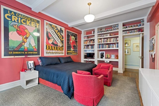 bedroom with beam ceiling and baseboards