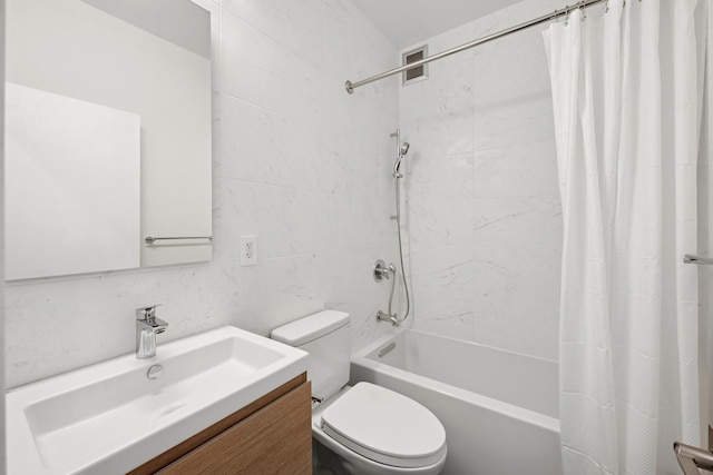 full bath featuring vanity, toilet, and shower / tub combo with curtain