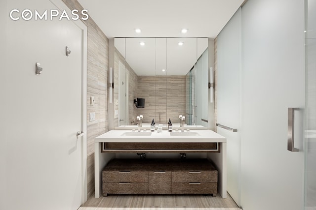 400 W 12th St Unit 4J, New York City, NY 10014 - bathroom with recessed lighting and vanity