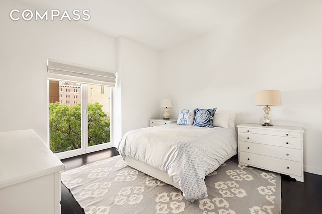 400 W 12th St Unit 4J, New York City, NY 10014 - bedroom featuring wood finished floors and vaulted ceiling
