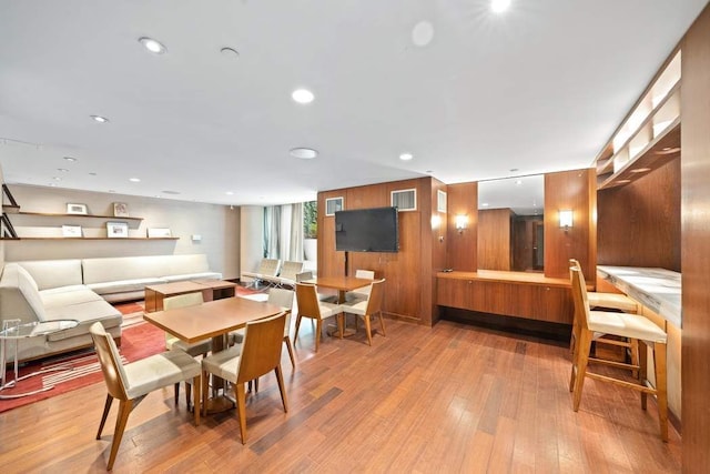 dining space featuring light wood finished floors