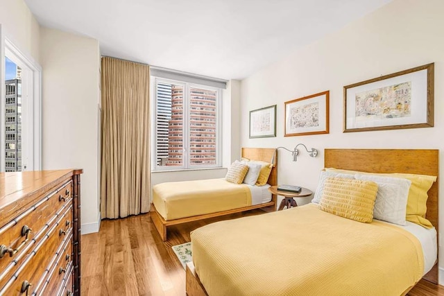 bedroom with light wood-style flooring